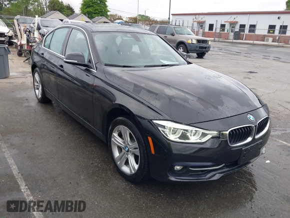 2018 BMW 3 Series 330i xDrive with VIN WBA8D9G50JNU69376, listed as a IAAI auction lot 41971138 with 61,551 mi miles. Bid and sale history available at carsss.com. Image 1.