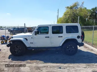 2020 Jeep Wrangler Unlimited Sahara with VIN 1C4HJXEN4LW330867, listed as a IAAI auction lot 41790709 with 63,151 mi miles. Bid and sale history available at carsss.com. Image 14.
