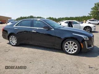 2015 Cadillac CTS Luxury RWD with VIN 1G6AR5SX2F0115311, listed as a Copart auction lot 58944915 with 34,764 mi miles and Salvage title. Bid and sale history available at DreamBid. Image 4.