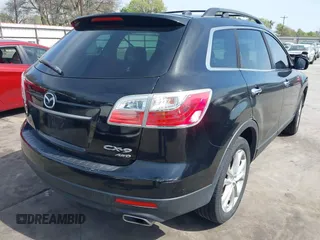 2011 Mazda CX-9 Grand Touring with VIN JM3TB3DA5B0300784, listed as a IAAI auction lot 41816110 with 138,523 mi miles and . Bid and sale history available at DreamBid. Image 4.