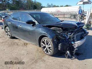 2018 Nissan Maxima SL with VIN 1N4AA6AP0JC386702, listed as a IAAI auction lot 41390476 with 118,493 mi miles and . Bid and sale history available at DreamBid. Image 1.