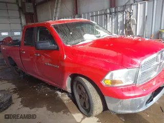 2011 Ram 1500 SLT with VIN 1D7RV1GP5BS535971, listed as a IAAI auction lot 41236443 with 185,641 mi miles. Bid and sale history available at carsss.com. Image 1.