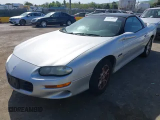 2002 Chevrolet Camaro Z28 z VIN 2G1FP22G722167574, wystawiony jako IAAI lot #41976510 z przebiegiem 114 863 mil mil oraz . Historia ofert i sprzedaży dostępna na DreamBid. Obrazek 17.