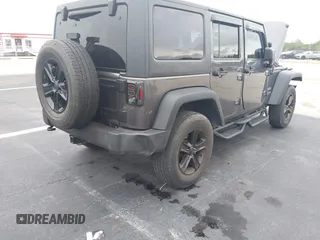 2018 Jeep Wrangler Unlimited Sport S with VIN 1C4BJWDG1JL810754, listed as a IAAI auction lot 42419199 with 74,901 mi miles and . Bid and sale history available at DreamBid. Image 6.