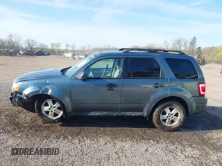 2012 Ford Escape XLT with VIN 1FMCU9D77CKB63827, listed as a IAAI auction lot 42044393 with 231,933 mi miles and . Bid and sale history available at DreamBid. Image 15.