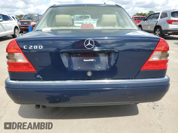 1996 Mercedes-Benz C with VIN WDBHA28E3TF392659, listed as a Copart auction lot 75169934 with Not Provided miles and Salvage Title. Bid and sale history available at carsss.com. Image 6.