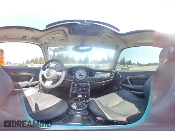 2006 MINI Hardtop with VIN WMWRC33586TJ77908, listed as a Copart auction lot 55095525 with 143,810 mi miles and Salvage title. Bid and sale history available at DreamBid. Image 14.