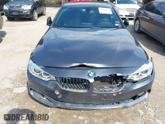 2015 BMW 4 Series 428i xDrive z VIN WBA3N5C55FK484938, wystawiony jako IAAI lot #41889907 z przebiegiem 100 439 mil mil oraz . Historia ofert i sprzedaży dostępna na DreamBid. Obrazek 6.