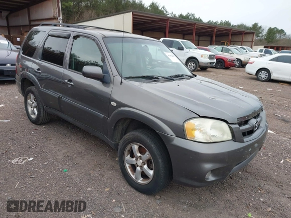 2006 Mazda Tribute S with VIN 4F2YZ04196KM12510, listed as a IAAI auction lot 41382627 with 242,650 mi miles and . Bid and sale history available at DreamBid. Image 1.