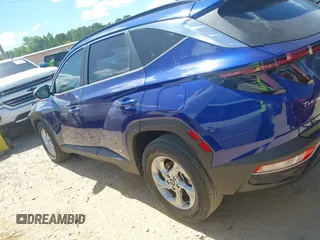 2022 Hyundai Tucson SEL with VIN 5NMJB3AE3NH059349, listed as a IAAI auction lot 42330576 with 27,010 mi miles and . Bid and sale history available at DreamBid. Image 14.