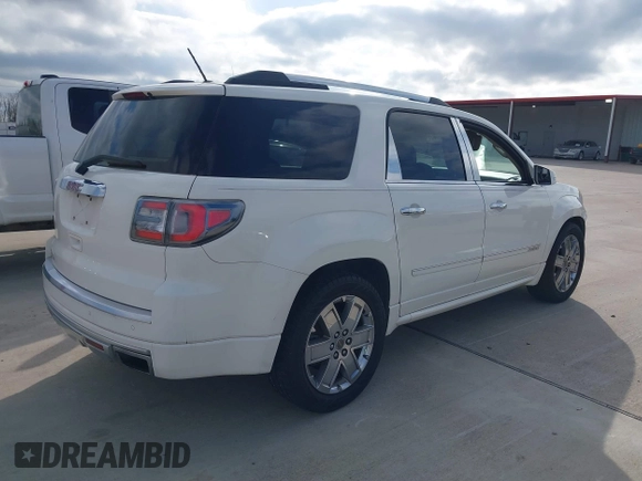 2014 GMC Acadia Denali z VIN 1GKKRTKD7EJ226915, wystawiony jako IAAI lot #41585231 z przebiegiem 146 847 mil mil oraz . Historia ofert i sprzedaży dostępna na DreamBid. Obrazek 4.