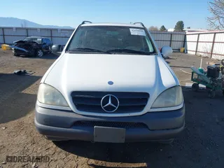 2001 Mercedes-Benz M-Class with VIN 4JGAB54E01A257846, listed as a IAAI auction lot 42010998 with 194,597 mi miles. Bid and sale history available at carsss.com. Image 12.