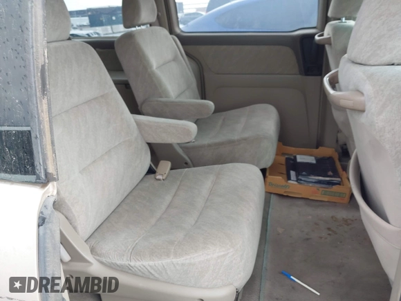 1999 Honda Odyssey EX z VIN 2HKRL1867XH535563, wystawiony jako IAAI lot #42188335 z przebiegiem 198 322 mil mil oraz . Historia ofert i sprzedaży dostępna na DreamBid. Obrazek 8.