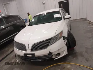 2014 Lincoln MKS with VIN 1LNHL9EK5EG605750, listed as a IAAI auction lot 41565308 with 167,835 mi miles. Bid and sale history available at carsss.com. Image 12.