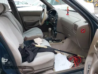 1996 Toyota Camry LE z VIN 4T1EF12K9TU116427, wystawiony jako IAAI lot #38696498 z przebiegiem 242 599 mil mil oraz . Historia ofert i sprzedaży dostępna na DreamBid. Obrazek 5.