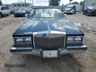 1984 Cadillac Seville z VIN 1G6AS6988EE829387, wystawiony jako Copart lot #75061224 z przebiegiem 643 mil mil oraz Szkody całkowita. Historia ofert i sprzedaży dostępna na DreamBid. Obrazek 5.