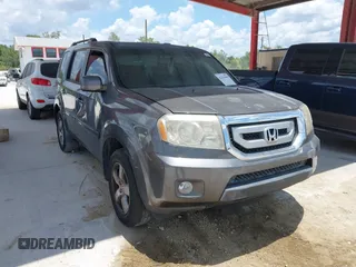 2011 Honda Pilot EX-L z VIN 5FNYF3H52BB048168, wystawiony jako IAAI lot #42336081 z przebiegiem 167 168 mil mil oraz . Historia ofert i sprzedaży dostępna na DreamBid. Obrazek 1.
