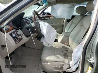 2007 Cadillac DTS Performance z VIN 1G6KD57967U131549, wystawiony jako Copart lot #70918804 z przebiegiem 73 618 mil mil oraz Szkoda całkowita • Salvage title. Historia ofert i sprzedaży dostępna na DreamBid. Obrazek 7.
