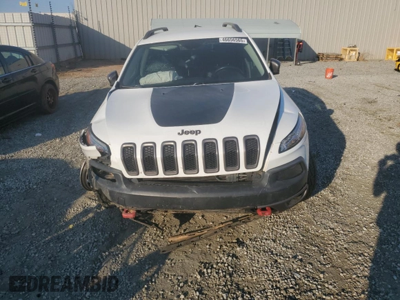 2015 Jeep Cherokee Trailhawk z VIN 1C4PJMBSXFW642149, wystawiony jako Copart lot #46656565 z przebiegiem 100 496 mil mil oraz Szkoda całkowita • Salvage title. Historia ofert i sprzedaży dostępna na DreamBid. Obrazek 5.