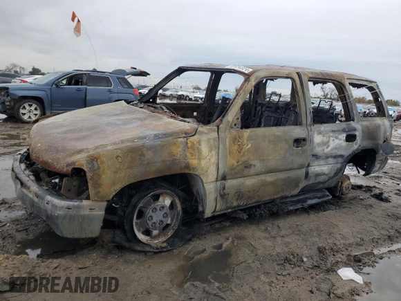 2003 Chevrolet Tahoe LS z VIN 1GNEC13T23J285248, wystawiony jako Copart lot #82634824 z przebiegiem Nie podano mil oraz Nie do naprawy • Non repairable. Historia ofert i sprzedaży dostępna na DreamBid. Obrazek 1.