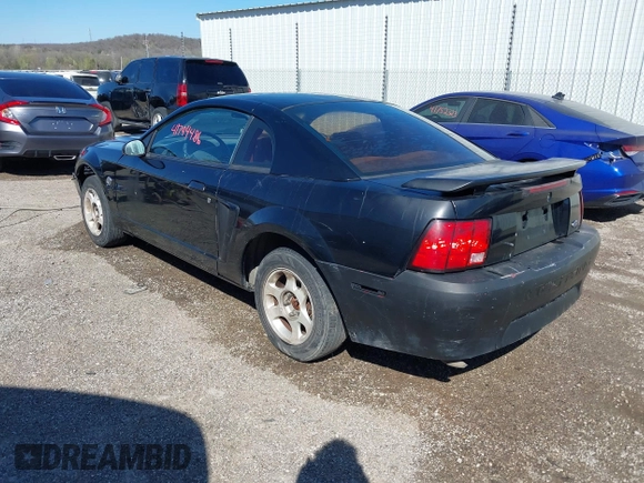 2004 Ford Mustang Standard with VIN 1FAFP40604F156534, listed as a IAAI auction lot 41794486 with 216,207 mi miles. Bid and sale history available at carsss.com. Image 3.