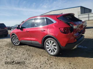 2021 Ford Escape Titanium Hybrid z VIN 1FMCU0DZ3MUA40397, wystawiony jako Copart lot #46353745 z przebiegiem 32 167 mil mil oraz Szkody całkowita. Historia ofert i sprzedaży dostępna na DreamBid. Obrazek 2.