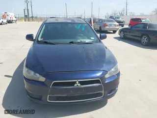2013 Mitsubishi Lancer SE with VIN JA32V2FW4DU002980, listed as a IAAI auction lot 41803574 with 195,940 mi miles. Bid and sale history available at carsss.com. Image 6.