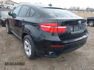 2014 BMW X6 xDrive35i z VIN 5UXFG2C56E0C45631, wystawiony jako IAAI lot #41967186 z przebiegiem 86 773 mil mil oraz . Historia ofert i sprzedaży dostępna na DreamBid. Obrazek 3.