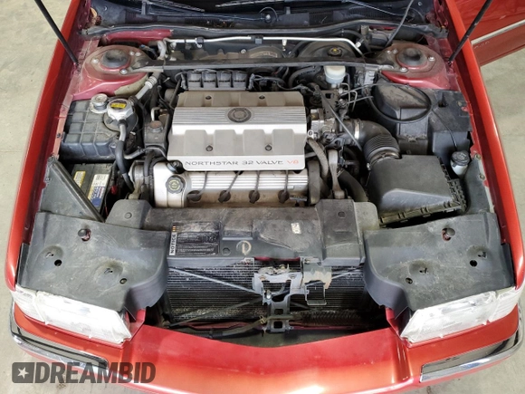 1996 Cadillac Eldorado z VIN 1G6EL12Y3TU620055, wystawiony jako Copart lot #72387994 z przebiegiem 128 641 mil mil oraz Czysty tytuł • Clean title. Historia ofert i sprzedaży dostępna na DreamBid. Obrazek 11.
