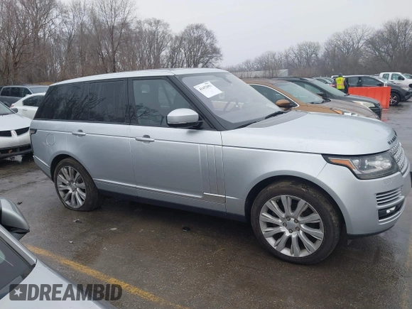 2014 Land Rover Range Rover HSE with VIN SALGS2WF7EA168583, listed as a IAAI auction lot 41452051 with 140,781 mi miles and . Bid and sale history available at DreamBid. Image 13.
