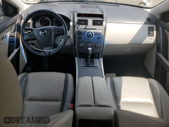 2012 Mazda CX-9 Grand Touring with VIN JM3TB2DVXC0361644, listed as a Copart auction lot 66092895 with 121,021 mi miles and Clean title. Bid and sale history available at DreamBid. Image 8.