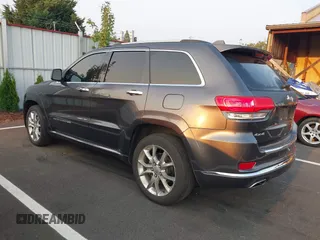 2015 Jeep Grand Cherokee Summit with VIN 1C4RJFJT3FC748507, listed as a IAAI auction lot 40271829 with 86,859 mi miles. Bid and sale history available at carsss.com. Image 3.