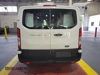 2019 Ford Transit z VIN 1FTYE1YM9KKA69150, wystawiony jako IAAI lot #42723249 z przebiegiem 226 890 mil mil oraz . Historia ofert i sprzedaży dostępna na DreamBid. Obrazek 22.