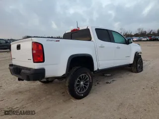 2021 Chevrolet Colorado 4WD ZR2 with VIN 1GCGTEEN8M1285957, listed as a Copart auction lot 44404555 with 55,615 mi miles and Salvage Title. Bid and sale history available at carsss.com. Image 3.