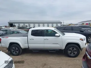 2018 Toyota Tacoma SR5 with VIN 3TMDZ5BN9JM051105, listed as a IAAI auction lot 41708034 with 98,000 mi miles and . Bid and sale history available at DreamBid. Image 13.