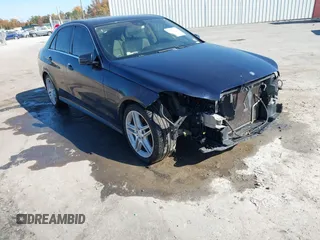 2014 Mercedes-Benz E-Class E 350 Luxury with VIN WDDHF8JB9EA842584, listed as a IAAI auction lot 40699399 with 160,687 mi miles. Bid and sale history available at carsss.com. Image 1.