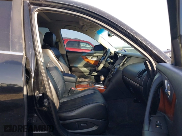 2014 Infiniti QX70 with VIN JN8CS1MU5EM450712, listed as a IAAI auction lot 41734354 with 164,349 mi miles and . Bid and sale history available at DreamBid. Image 5.