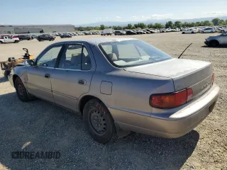 1996 Toyota Camry DX z VIN JT2BG12K7T0419839, wystawiony jako Copart lot #58267425 z przebiegiem 215 456 mil mil oraz Szkoda całkowita • Salvage title. Historia ofert i sprzedaży dostępna na DreamBid. Obrazek 2.