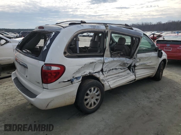 2001 Chrysler Town & Country LXi with VIN 2C8GP54L11R402563, listed as a Copart auction lot 86108164 with 179,021 mi miles and Salvage Title. Bid and sale history available at DreamBid. Image 3.