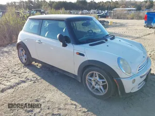 2006 MINI Hardtop with VIN WMWRC335X6TK16871, listed as a IAAI auction lot 41846929 with 145,709 mi miles and . Bid and sale history available at DreamBid. Image 1.