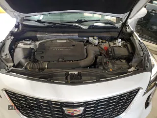 2019 Cadillac XT4 AWD Premium Luxury z VIN 1GYFZDR47KF103343, wystawiony jako Copart lot #60651465 z przebiegiem 91 936 mil mil oraz Szkoda całkowita • Salvage title. Historia ofert i sprzedaży dostępna na DreamBid. Obrazek 12.