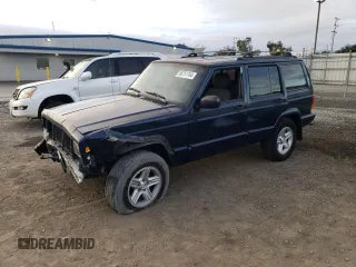 2001 Jeep Cherokee Sport z VIN 1J4FF58S71L535901, wystawiony jako Copart lot #86751744 z przebiegiem 195 306 mil mil oraz Szkoda całkowita • Salvage title. Historia ofert i sprzedaży dostępna na DreamBid. Obrazek 1.