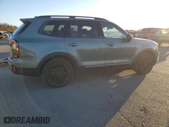 2023 Kia Telluride EX X-Line z VIN 5XYP3DGCXPG360992, wystawiony jako Copart lot #86904934 z przebiegiem 15 947 mil mil oraz Szkoda całkowita • Salvage title. Historia ofert i sprzedaży dostępna na DreamBid. Obrazek 3.