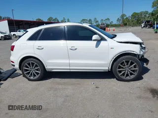 2018 Audi Q3 Premium Plus z VIN WA1JCCFS3JR028436, wystawiony jako IAAI lot #42067256 z przebiegiem 63 722 mil mil oraz . Historia ofert i sprzedaży dostępna na DreamBid. Obrazek 13.