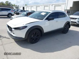 2022 Mazda CX-30 2.5 Turbo Premium Package with VIN 3MVDMBDY3NM437897, listed as a IAAI auction lot 41715776 with 42,771 mi miles. Bid and sale history available at carsss.com. Image 17.