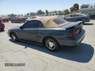 1998 Ford Mustang with VIN 1FAFP4447WF156297, listed as a Copart auction lot 60757265 with 61,296 mi miles and Salvage title. Bid and sale history available at DreamBid. Image 2.
