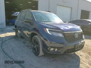 2019 Honda Passport Elite z VIN 5FNYF8H05KB012427, wystawiony jako Copart lot #50409635 z przebiegiem 72 814 mil mil oraz Szkoda całkowita • Salvage title. Historia ofert i sprzedaży dostępna na DreamBid. Obrazek 14.