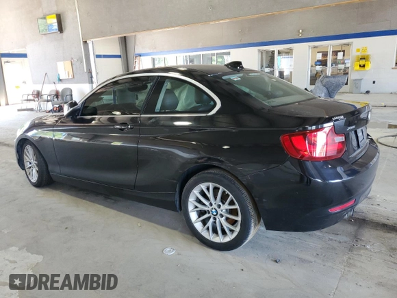 2015 BMW 2 Series 228i xDrive with VIN WBA1G9C51FVX96763, listed as a Copart auction lot 69091454 with 100,816 mi miles and Salvage Title. Bid and sale history available at DreamBid. Image 2.