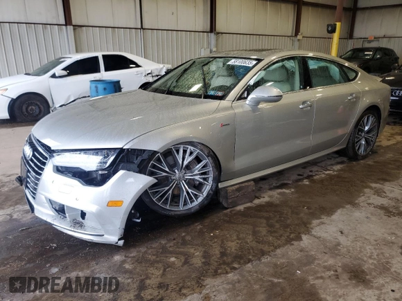 2018 Audi A7 Premium Plus with VIN WAUW3AFC1JN032336, listed as a Copart auction lot 58100635 with 36,976 mi miles and Salvage title. Bid and sale history available at DreamBid. Image 1.