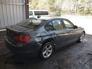 2015 BMW 3 Series 328i xDrive with VIN WBA3B5G50FNS15859, listed as a IAAI auction lot 41999035 with 87,560 mi miles. Bid and sale history available at carsss.com. Image 4.